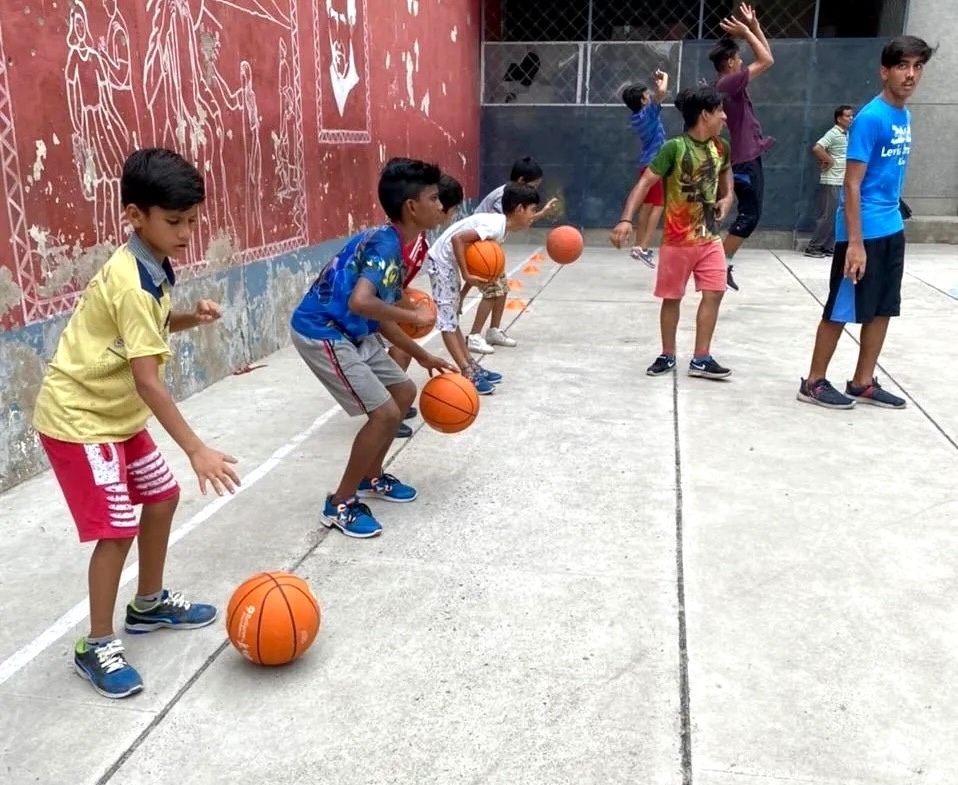 Student-athlete at Don Bosco Ashalayam training in Basketball with IB Sports Academy.