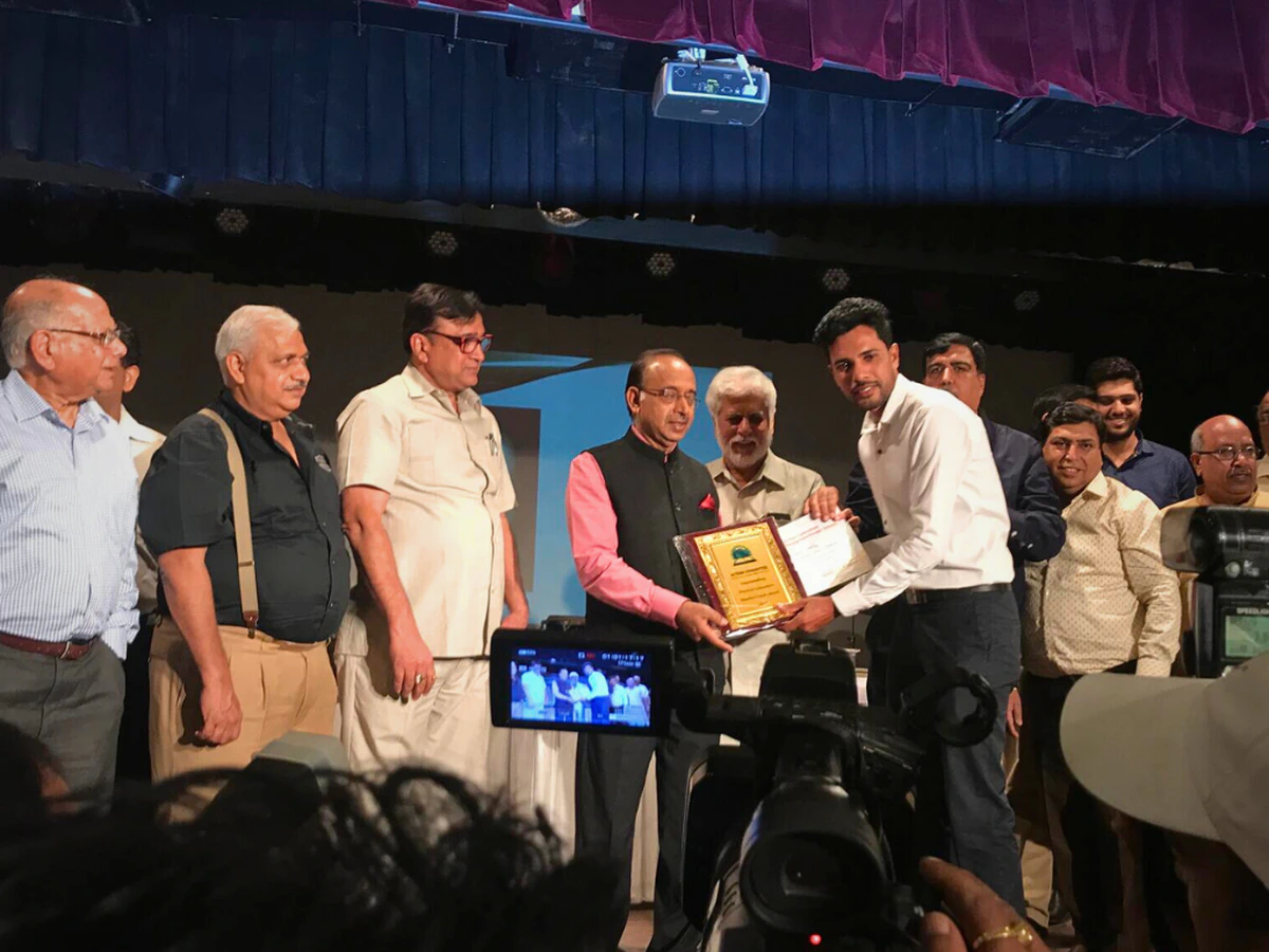 Coach Ishwar Bhati being honored by Mr. Vijay Goel, Hon’ble Minister