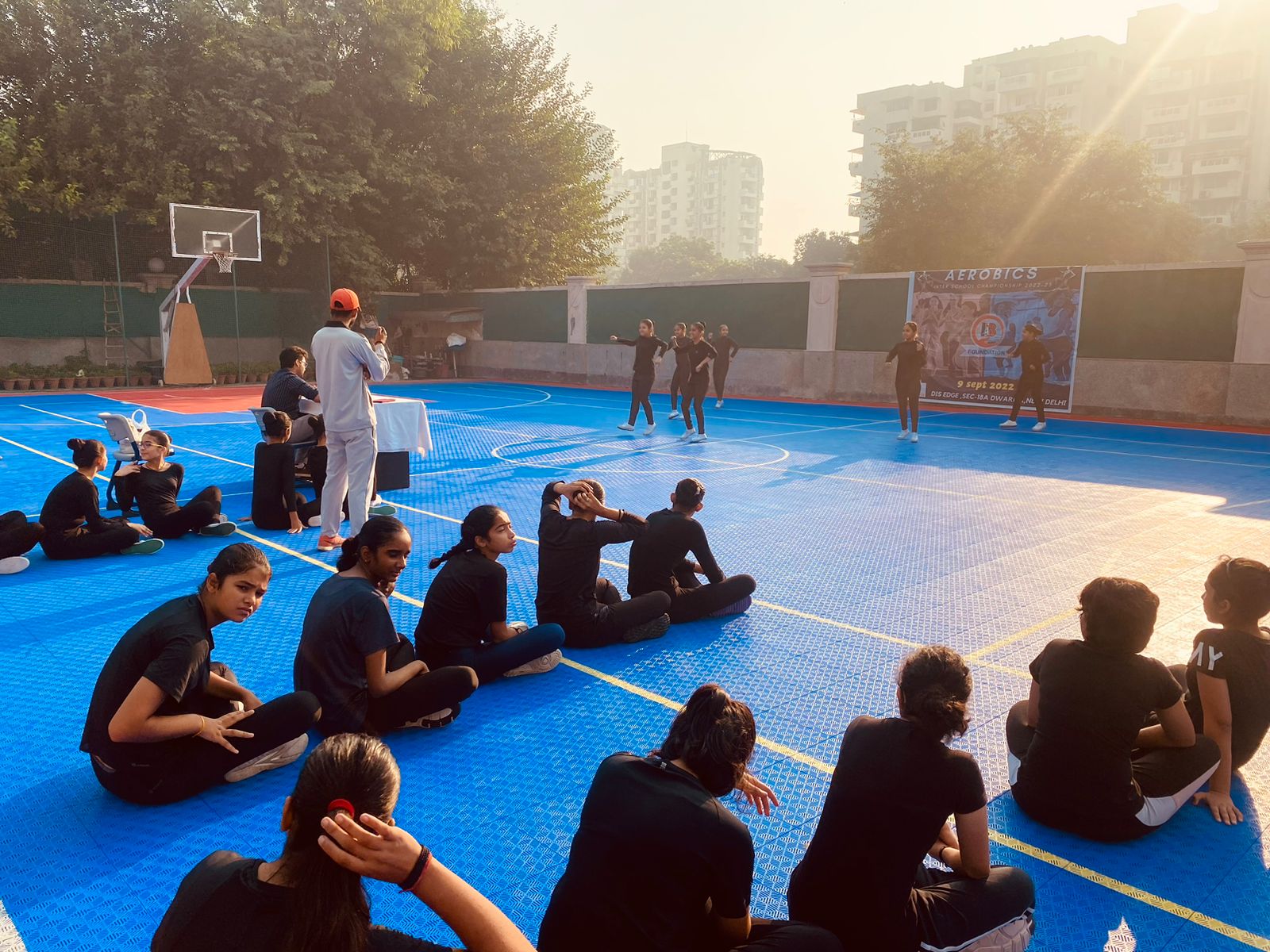 Dynamic Group Performance Showcasing Rhythm and Teamwork at the IB Sports Foundation Event