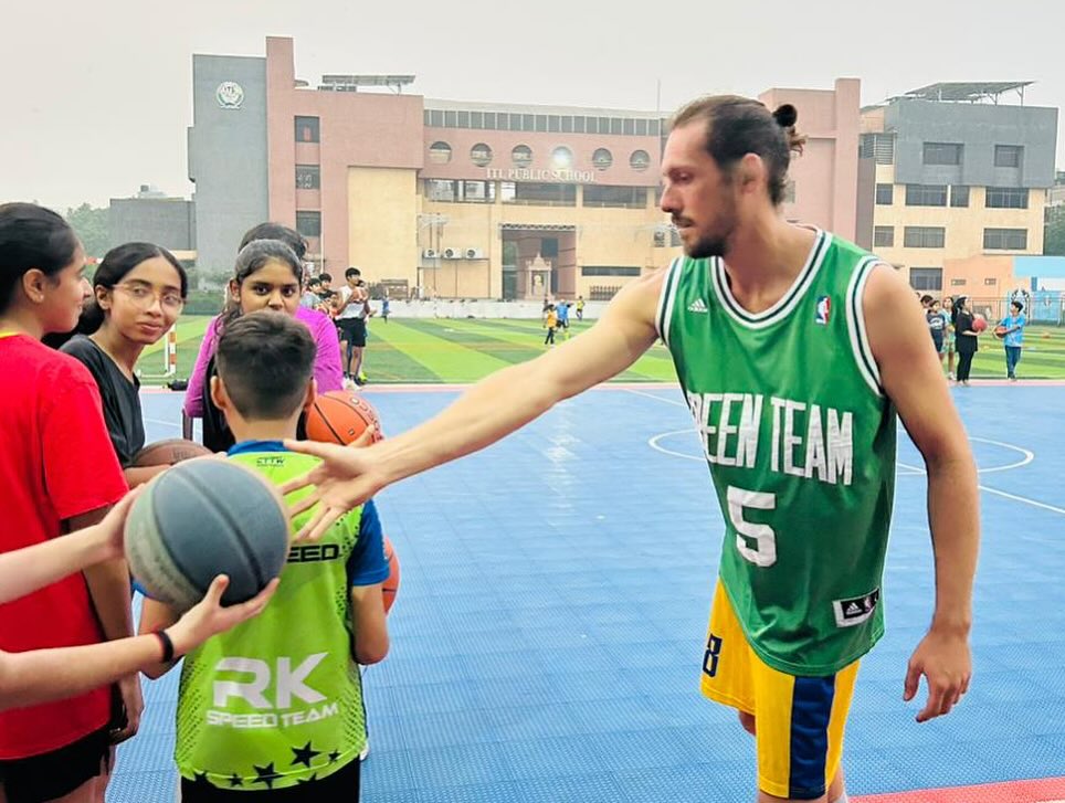 Coach Benjamin Bari Mentoring Young Ballers During the Interactive Clinic Session