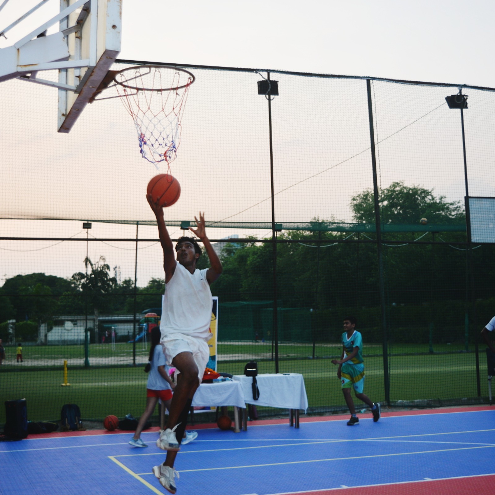 A Student-Athlete Practicing Fundamentals Under the 'Rise Through Hoops' Initiative at IB Sports Academy