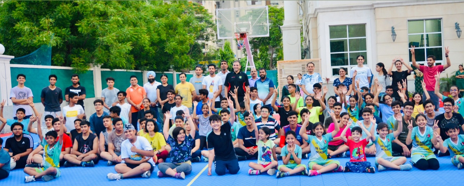 Group Photo of Coach Naoufal Uariachi With IB Sports Academy Coaches and Students After the Clinic