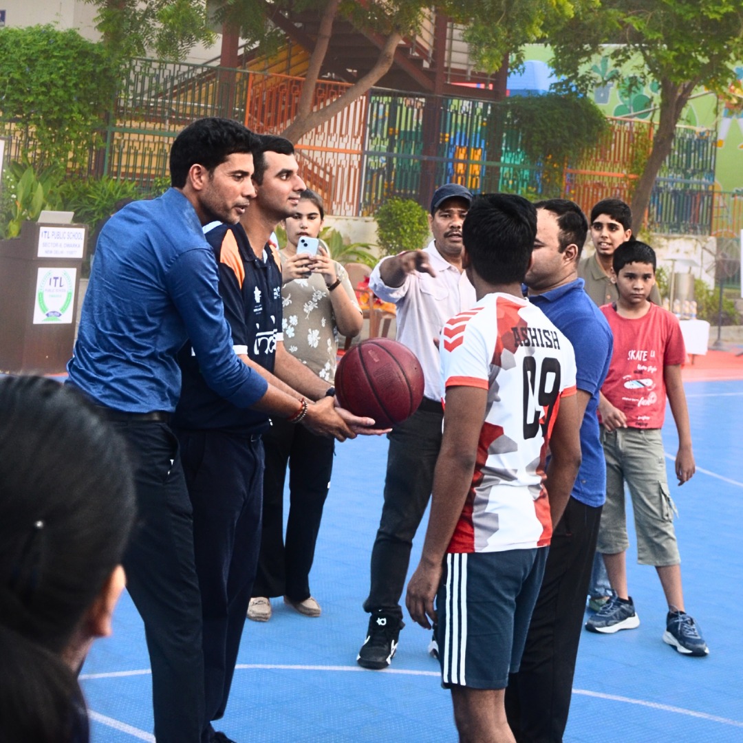 Special Olympian Ranveer Singh Saini Taking a Shot During the Inaugural Basketball Match
