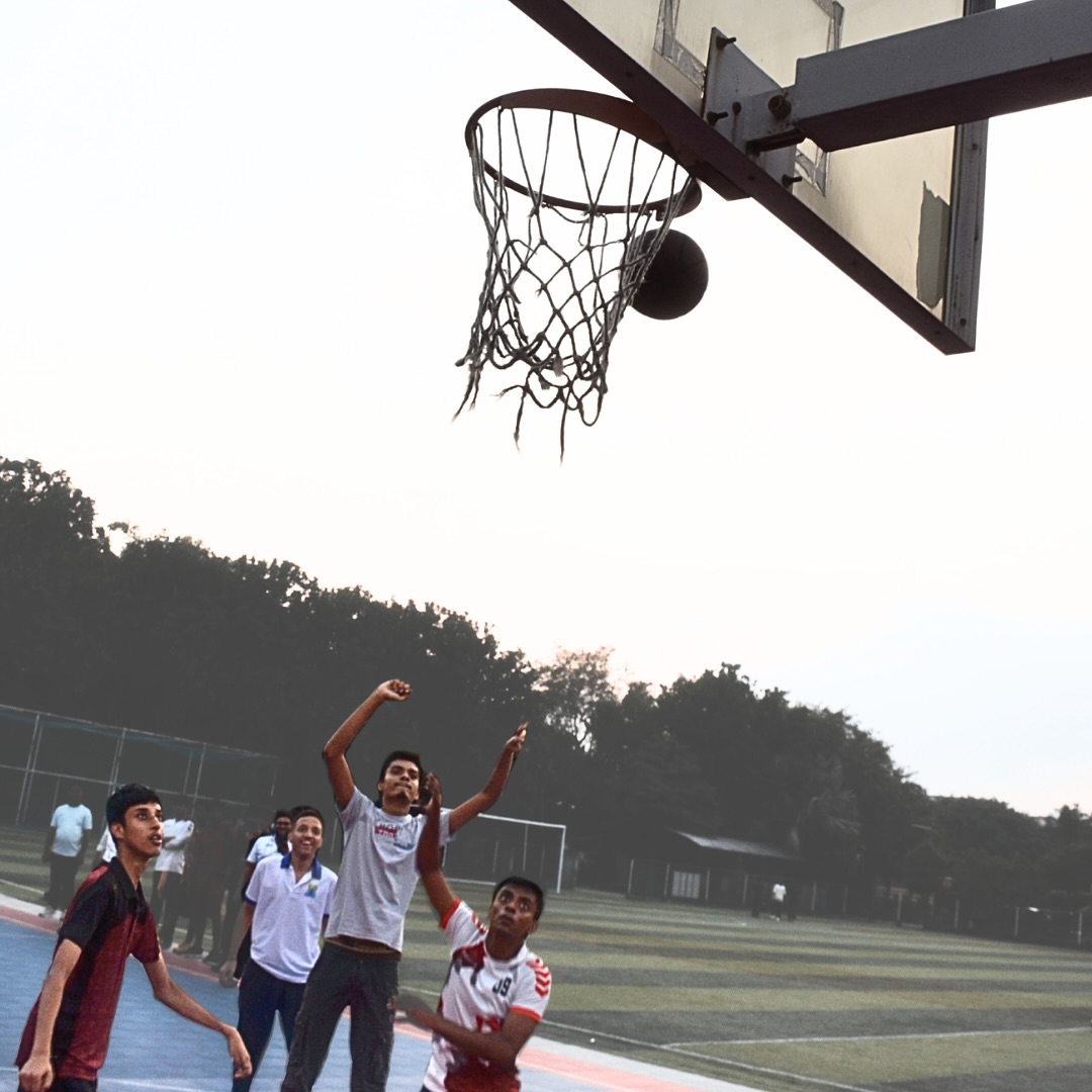 A Special Needs Student Making a Basket, Celebrating Ability and Success on the Court