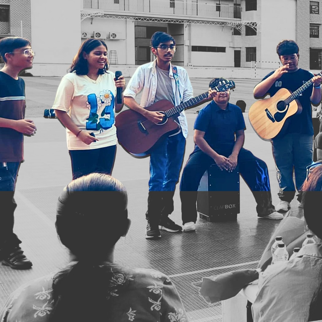Musical Performance With a Guitar During the Community Outreach Event at ITL Public School